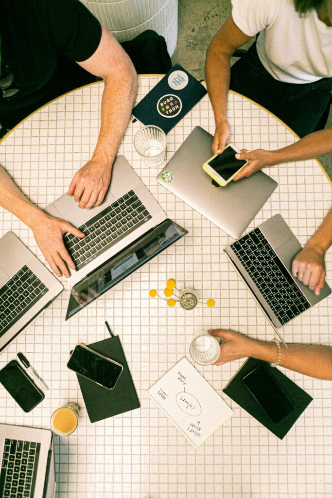 Digital Marketing team analysing seo and social media strategies on laptops